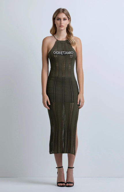 Woman wearing olive green crochet midi dress with halter neckline and 'ODI ET AMO' text