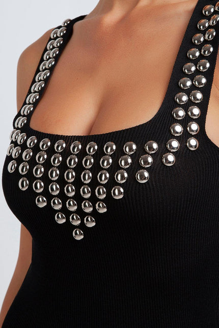 Black ribbed tank top with metallic stud embellishments on straps and neckline, women's fashion