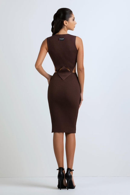 Woman wearing brown ribbed midi dress with side cut-outs and back detail, high heels