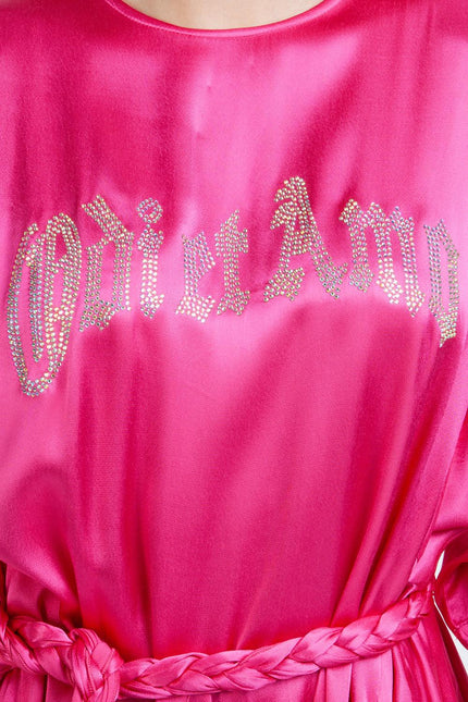 Fuchsia satin dress with crystal embellished 'Odi et Amo' text and braided belt detail
