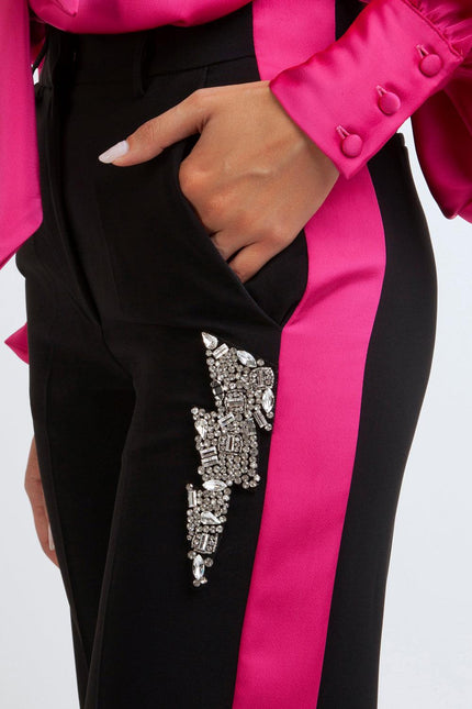 Black pants with hot pink side stripe and jeweled lightning bolt embellishment