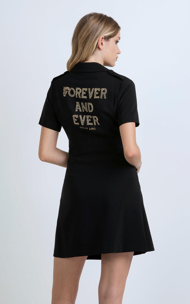 Woman wearing black short-sleeve dress with gold studded 'FOREVER AND EVER' text on back