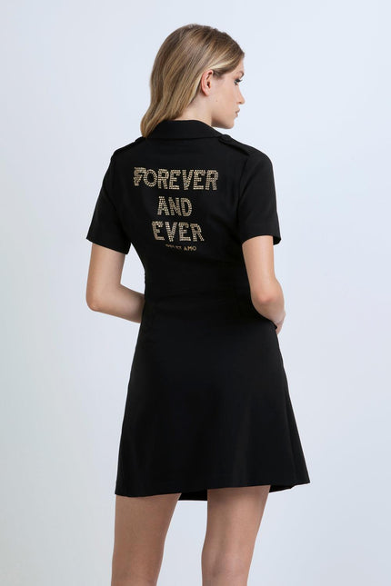 Woman wearing black short-sleeve dress with gold studded 'FOREVER AND EVER' text on back