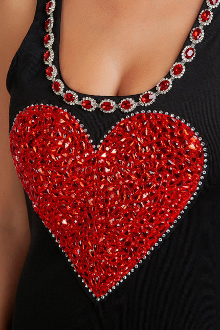 Black top with large red crystal heart and jeweled neckline, women's fashion detail