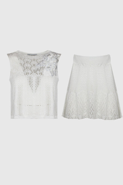 COORDINATO TOP E GONNA IN MAGLIA MACRAME SEMITRASPARENTE CON PATCH GIOIELLO