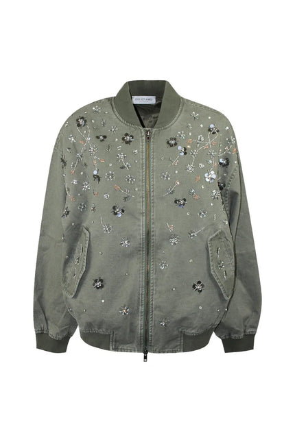 Bomber verde militare con chiusura a zip e ricami floreali in paillettes e strass su sfondo bianco