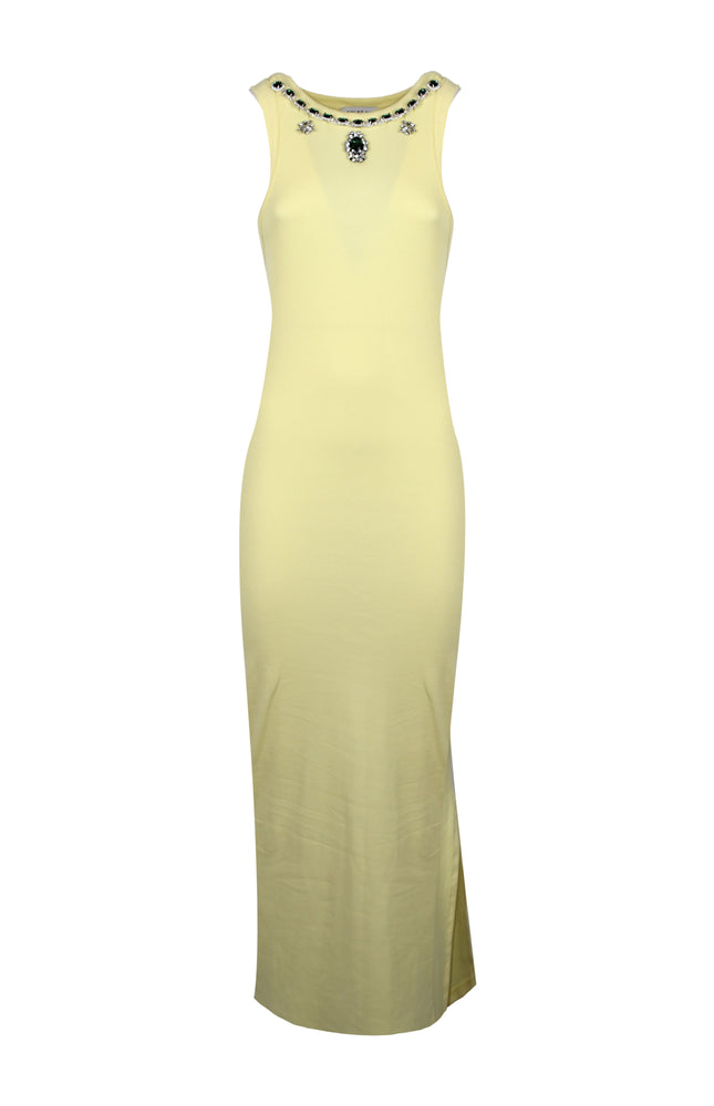Un perfetto connubio di comfort e glamour, questo vestito lungo a coste in puro cotone si distingue per l'applicazione di pietre sul girocollo e lo spacco laterale.