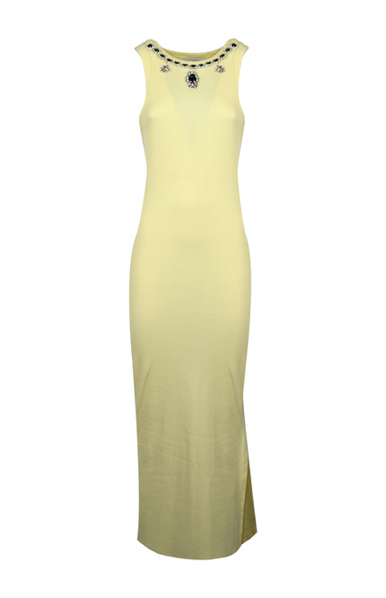 Un perfetto connubio di comfort e glamour, questo vestito lungo a coste in puro cotone si distingue per l'applicazione di pietre sul girocollo e lo spacco laterale.