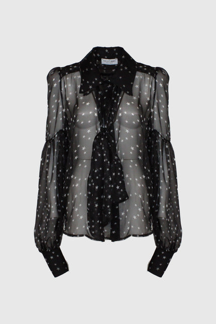 Sheer black blouse with star print, long sleeves, tie neck, and buttoned cuffs