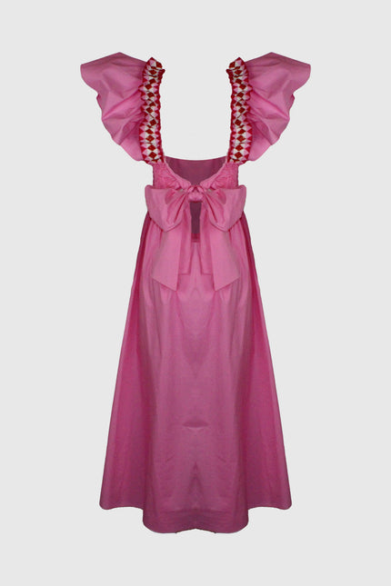 Pink retro dress with ruffled sleeves, red embroidered straps, and large front bow