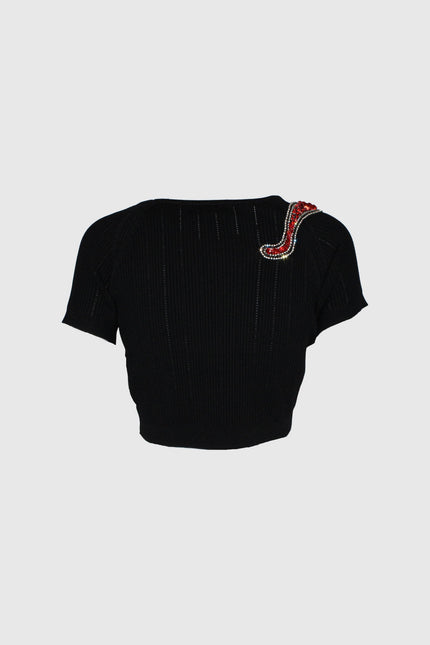 Black ribbed knit top with red snake embellishment on shoulder, short sleeves, front view