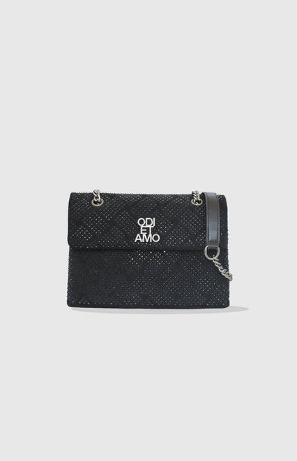 Black quilted shoulder bag with silver studs and chain strap on white background