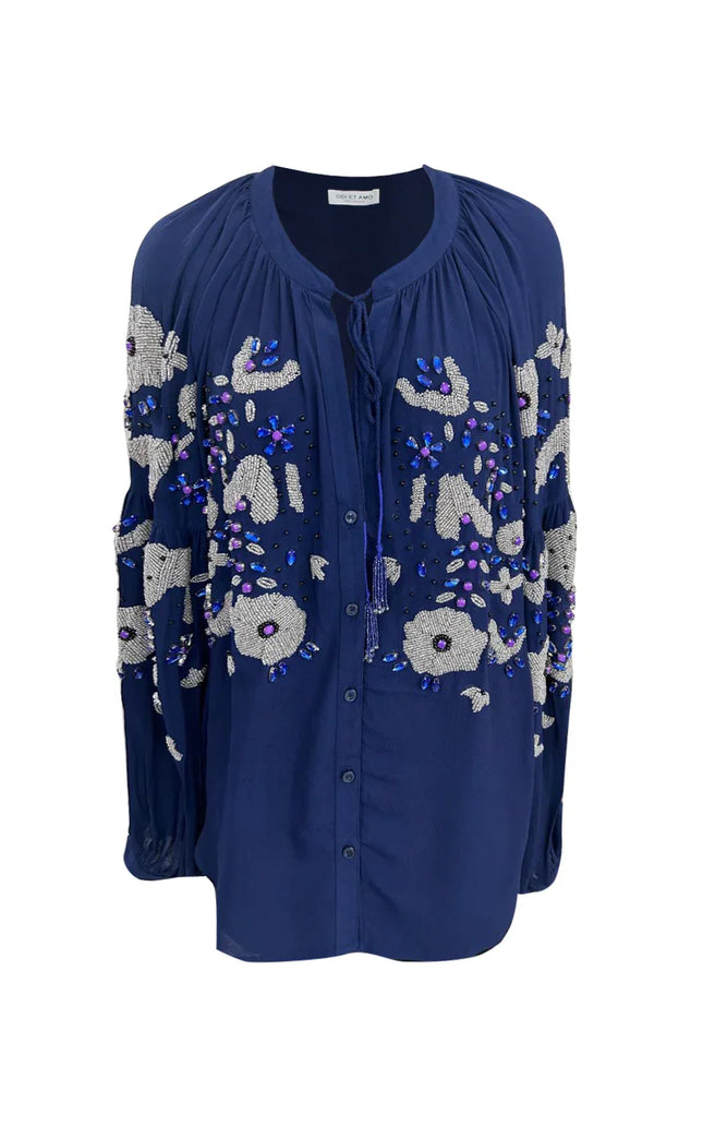 Blue embellished women's blouse with beaded floral details and button front