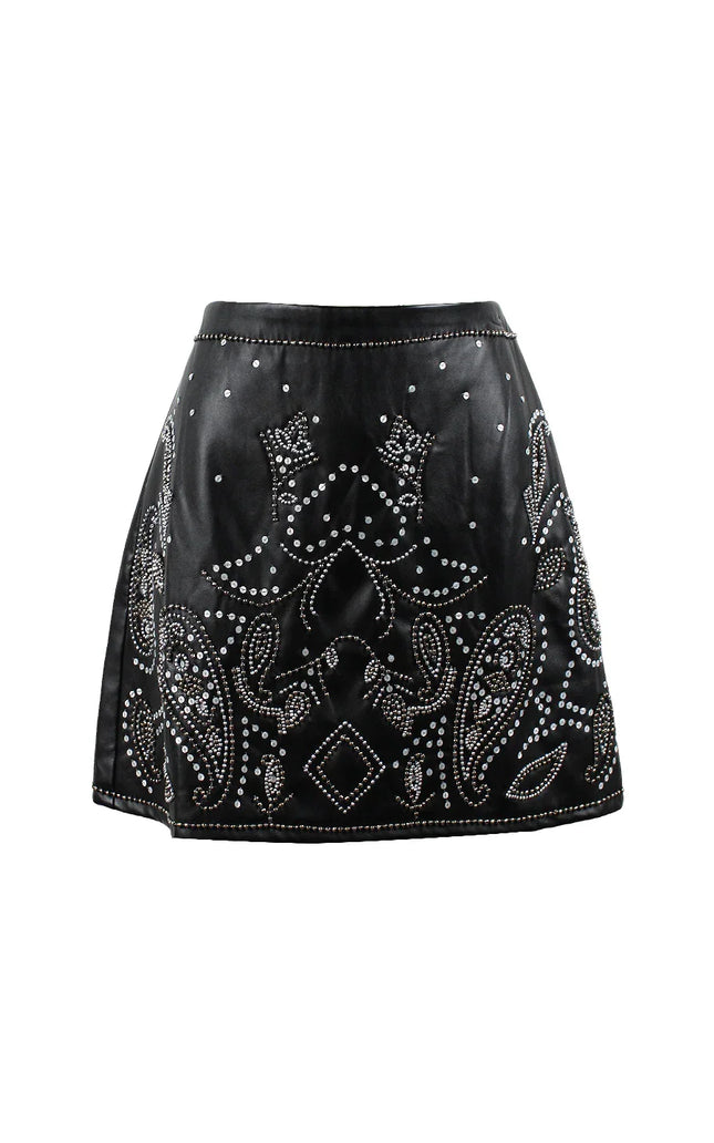 Black mini skirt with silver studded paisley and geometric patterns, front view