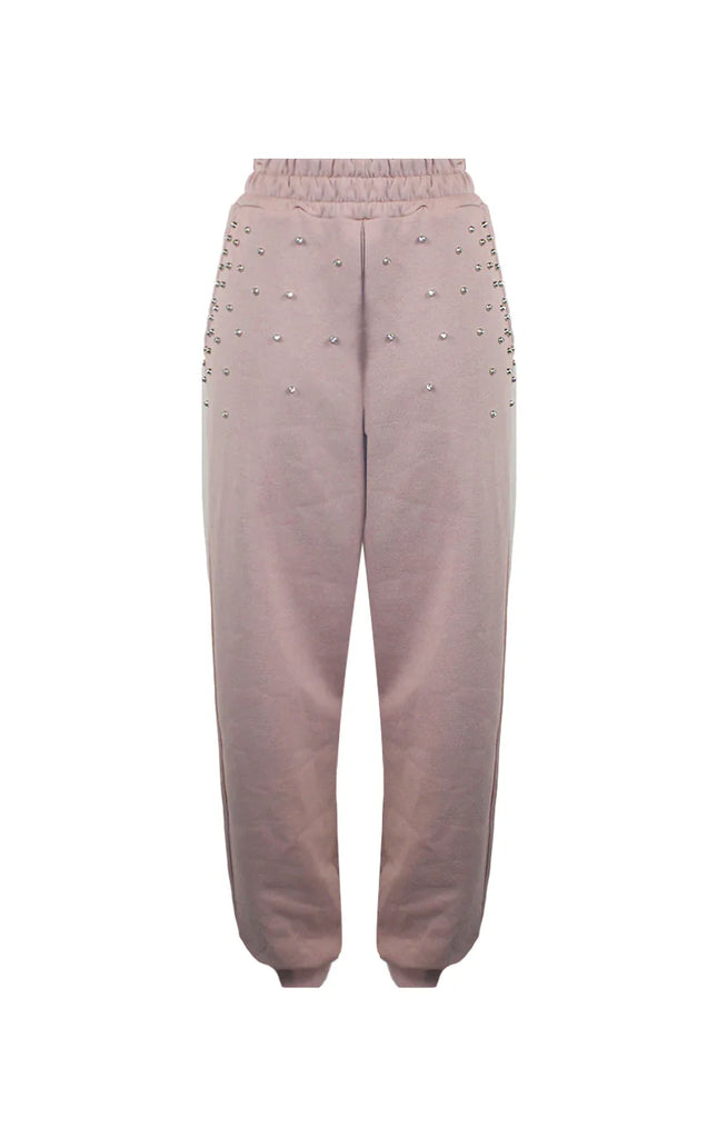 Light pink jogger pants with silver stud embellishments and elastic waistband