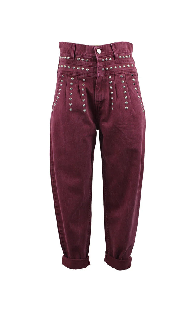 Women's high-waisted burgundy jeans with silver studs and cuffed hems
