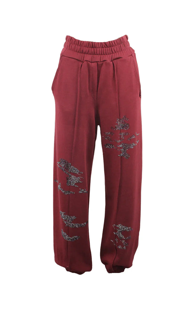 Burgundy women's jogger pants with rhinestone details and elastic waist
