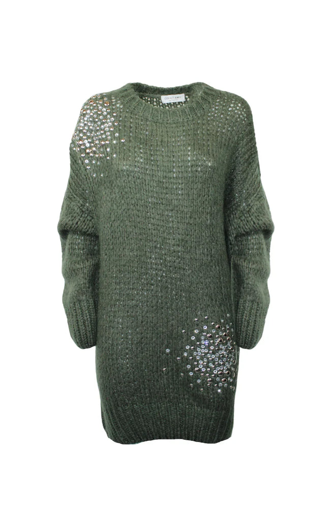 Chunky green knit sweater dress with sequin embellishments on shoulder and hem.