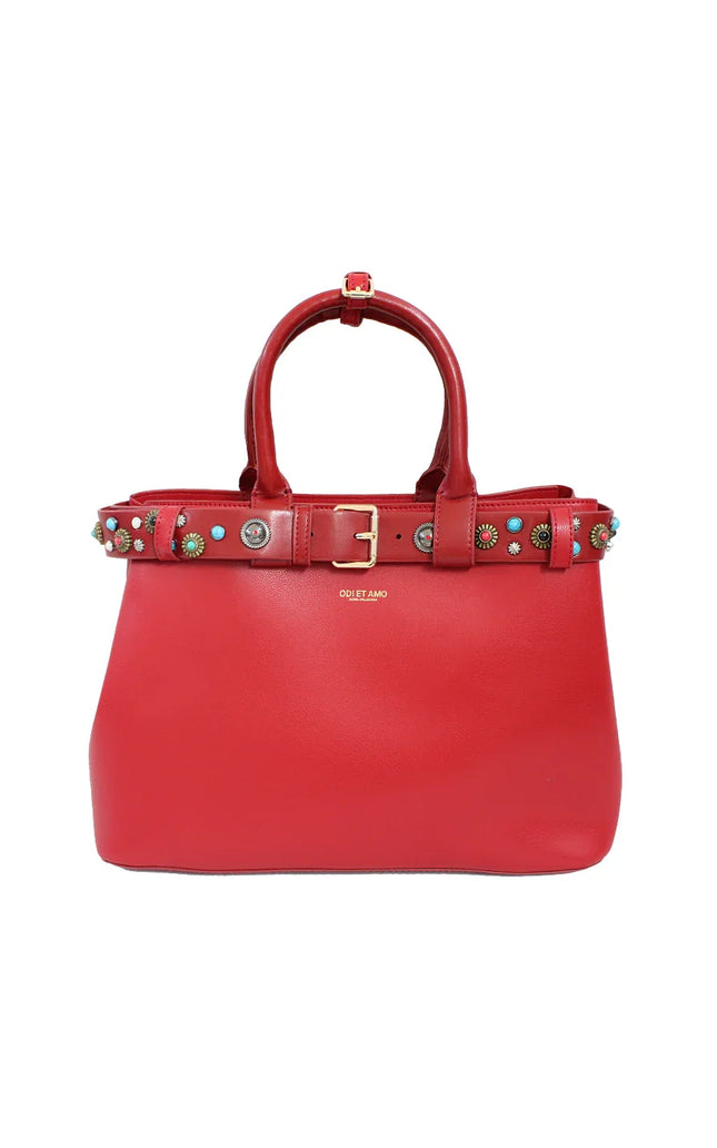 Red leather handbag with top handles, decorative studded belt, and gold buckle detail