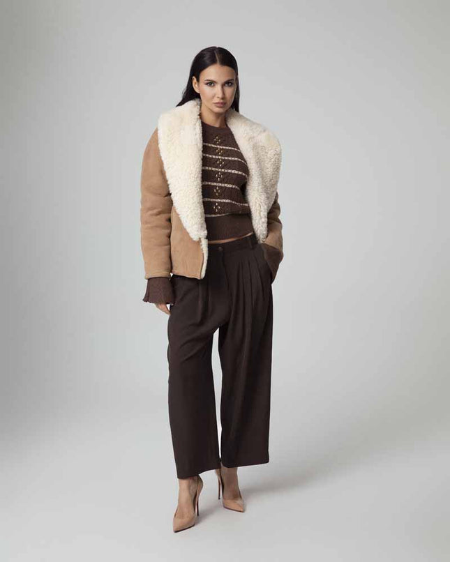 ALT Text: Lavorazione a treccia bicolor e cristalli style MAGLIA CROPPED LAVORAZIONE TRECCIA CON CRISTALLI for women
