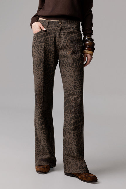 ALT Text: Strass tono su tono style PANTAPALAZZO BULL STAMPATO CON STRASS for women