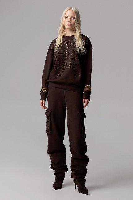 ALT Text: Trendy Italian PANTALONE CARGO CON STRASS MOTIVO TIGRE for glamour look