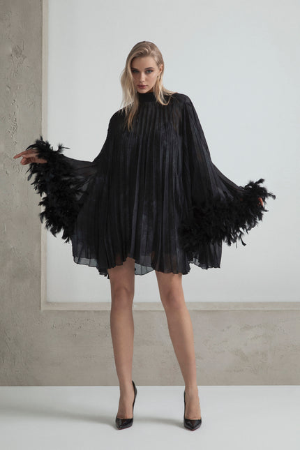 SEMI-TRANSPARENT PLEATED MINI DRESS WITH FEATHERS AND PETTICOAT