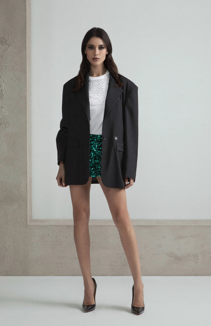 Giacca blazer oversize destrutturata grigia con tasche a pattina.