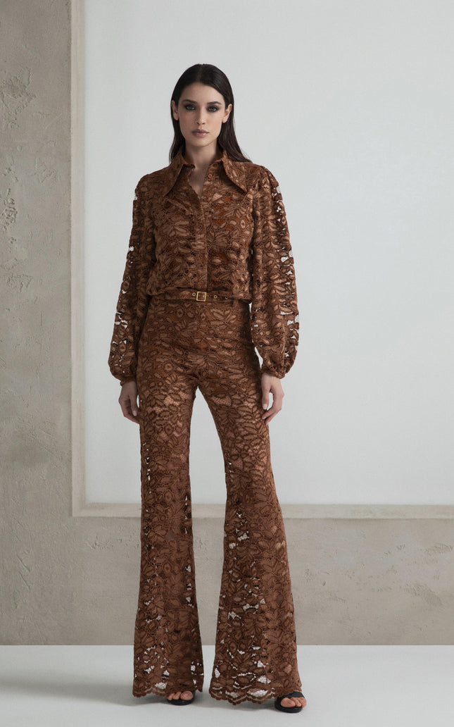 Woman wearing brown lace long sleeve shirt and matching flared pants, fashion look