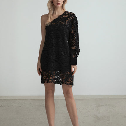 Woman wearing a black lace one-shoulder dress with long sleeve and scalloped hem