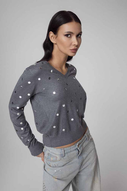 MAGLIA SCOLLO A V CON BORCHIE