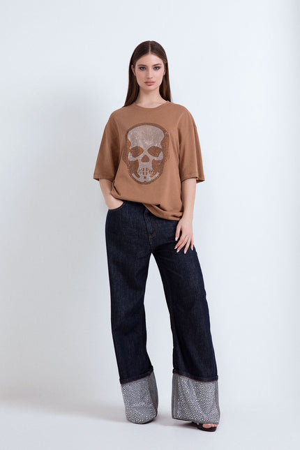 Oversize brown cotton t-shirt with an intricate rhinestone skull design.