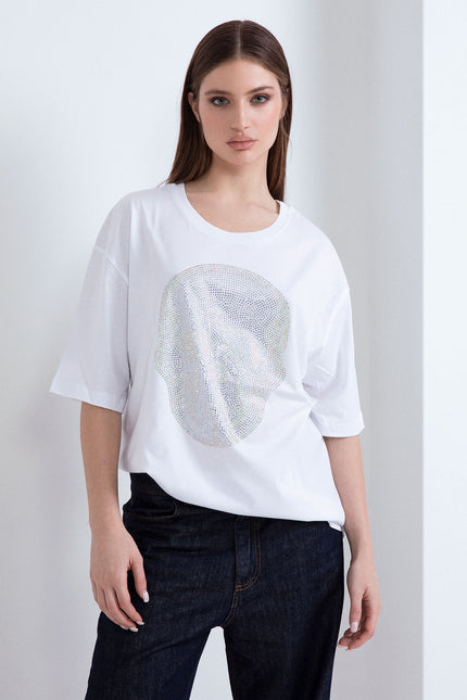 Oversize white cotton t-shirt featuring a rhinestone skull print design.