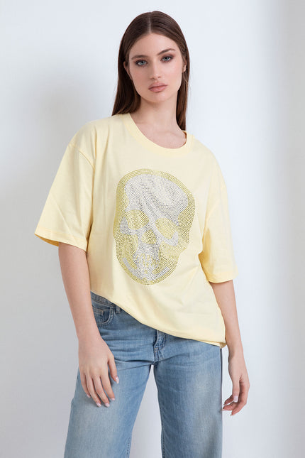 Oversize yellow cotton t-shirt with a rhinestone skull print on the front.