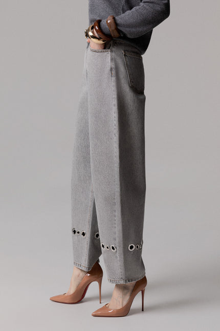 JEANS A PALLONCINO GRIGIO CON OCCHIELLI
