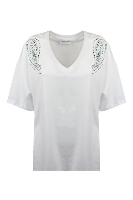 T-shirt oversize bianca con scollo a V e stampa grafica doodle nera sul davanti.