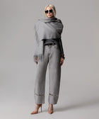 JEANS A PALLONCINO GRIGIO CON OCCHIELLI