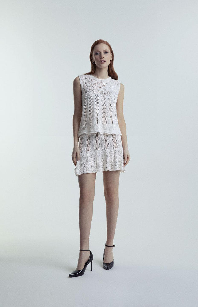 COORDINATO TOP E GONNA IN MAGLIA MACRAME SEMITRASPARENTE CON PATCH GIOIELLO