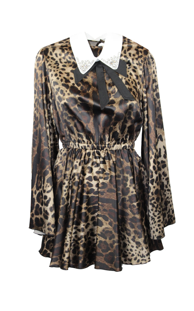 Leopard print mini dress with wide white collar, rhinestone trim, and black ribbon bow.