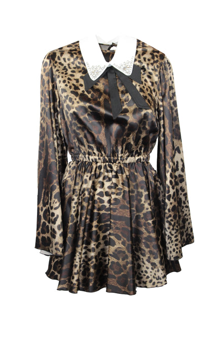 Leopard print mini dress with wide white collar, rhinestone trim, and black ribbon bow.